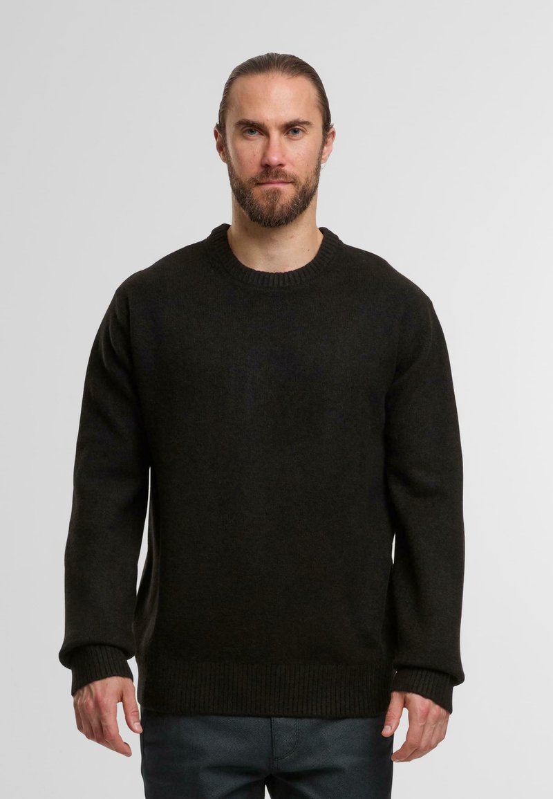 Dunkelgrüner Strickpullover mit rundem Halsausschnitt, gerippten Ärmeln und Bund. Hergestellt aus strukturiertem Material, bietet eine lockere Passform.