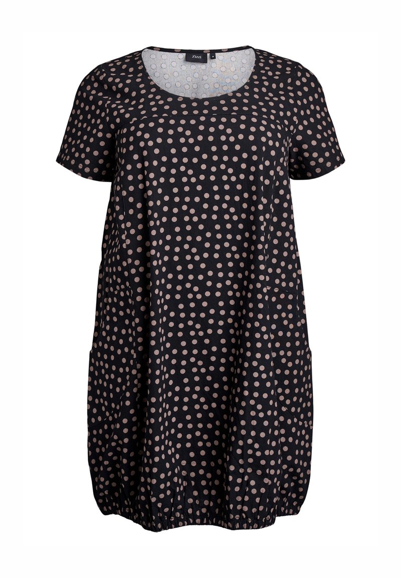 Schwarzes Kleid mit weißen Punkten, kurzen Ärmeln, rundem Ausschnitt und elastischem Saum. Besitzt große beigefarbene Punkte und eine lockere, lässige Passform.