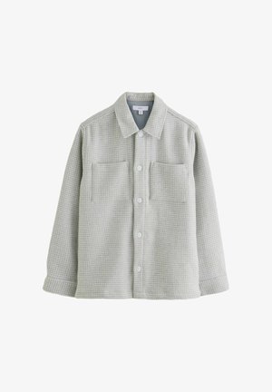 Light gray checkered shirt in soft fabric, featuring a button-up front, two chest pockets, and a classic collar. Long sleeves with button cuffs.