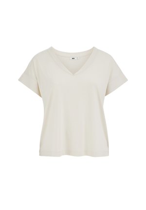 Svijetlo bež kratkih rukava majica s V-izrezom, izrađena od mekanog materijala, s opuštenim krojem i minimalnim šavovima uz rub i rukave.