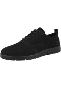 Zapatos de ante negro con punta redondeada, suela plana, diseño con cordones y un pequeño contrafuerte en el talón. Textura suave y estilo minimalista.