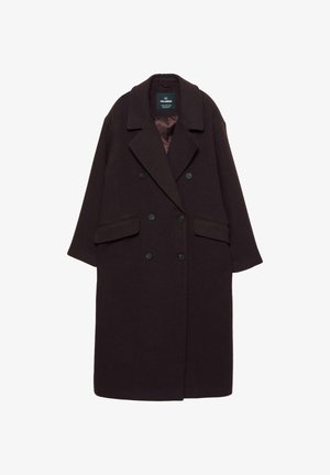 Dvostruko dugovanje kaput u tamnoburgundskom vune-krpnom materijalu. Ima široke reveri, dva prednja džepa i crne dugmadi. Unutrašnjost podstavljena satin završnicom.