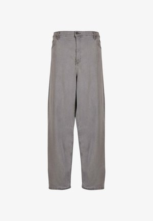 Pantalons en denim gris avec une taille haute, coupe large, fermeture éclair à l'avant et bouton. Texture lisse avec un design minimaliste.