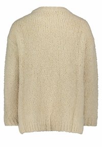 Krémově zbarvený široký kardigan z texturovaného pleteného materiálu. Má dlouhé rukávy a žebrovaný lem. Jednoduchý a pohodlný design.