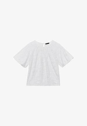 Witte top met bloemenpatroon, korte brede mouwen en een keyhole detail op de rug. Gemaakt van lichtgewicht stof met een textuurafwerking.