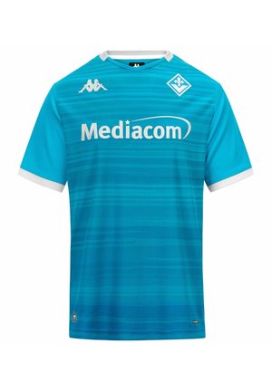Maillot de football bleu vif avec bordure blanche, logo Mediacom centré, logo Kappa sur la poitrine droite et emblème de l'équipe en forme de losange sur la poitrine gauche.