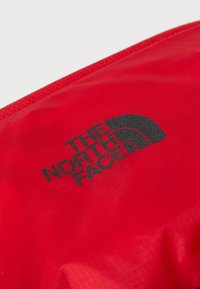 The North Face SUNRISER RUN VEST UNISEX - Mochila de hidratación - red/black