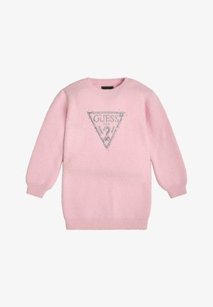 Pull rose doux à manches longues avec poignets et ourlet côtelés, arborant un logo triangulaire "GUESS USA" en paillettes argentées avec un point d'interrogation au centre.