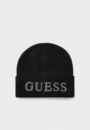 Zwarte gebreide beanie met omgeslagen manchet, met het woord "GUESS" in zilveren strass-steentjes aan de voorkant.