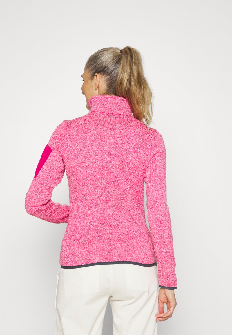 Pullover in pile, tessuto rosa melange, colletto alto, maniche lunghe con toppe rosa a contrasto sui gomiti, tessuto testurizzato, design aderente.