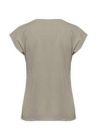 T-shirt vert olive à manches courtes, avec un col rond et une coupe ample. Texture lisse avec des coutures surpiquées et un ourlet droit.