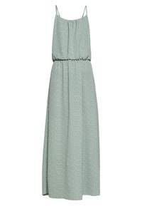 Robe longue, ample, de couleur vert clair, avec de fines bretelles et des pois blancs. Taille froncée ; tissu doux et fluide ; design longueur cheville.