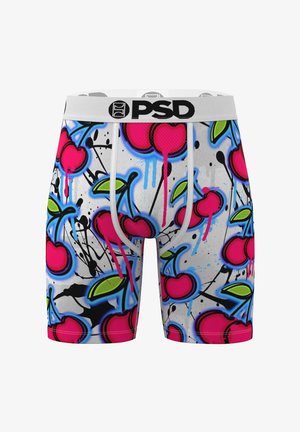 Herrenslips mit weißem Grund, lebhaftem Kirschen- und Blattdesign, Spritzern in Pink und Blau sowie kontrastierender schwarzer Umrandung.