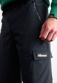 Ellesse TERATILO - Pantalon cargo - black
