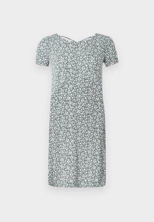 Short-sleeve dress in light green fabric with white floral print, featuring a V-neckline and relaxed fit, knee-length design.