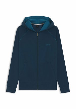 Marineblauwe sweatvest met een teal kleurige voering in de capuchon, voorzakken, geribde manchetten en subtiele logodetails. Gemaakt van een zachte, gladde stof.