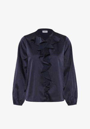 Laivastonsininen satiinipusero, jossa pitkät hihat, röyhelöinen pääntiedetalji ja joustavat hihansuut. Sileä pinta, rento istuvuus ja pyöreä helma.