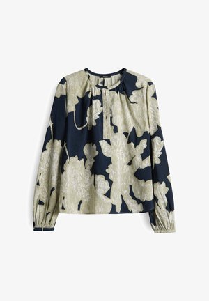 Langarm blouse met marineblauw en beige abstract bloemmotief, ronde halslijn en kleine knoopsluiting aan de voorkant.