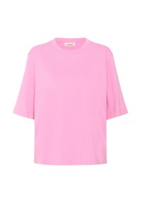 Camiseta de algodón de manga corta en color rosa, con cuello redondo y ajuste relajado. Textura suave sin patrones o acentos visibles.