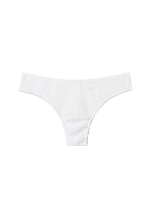String en dentelle blanche avec motif floral, taille élastique et bords sans couture. Matière légère avec une texture douce.