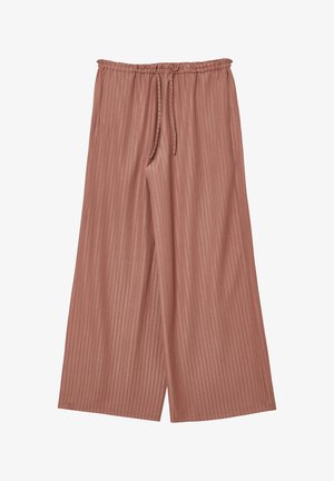 Hosen aus weichem, geripptem Stoff in einem staubigen Rosaton. Mit elastischem Bund und Kordelzug sowie weitem Bein-Design.