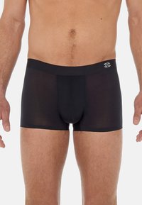 Black men's boxer briefs made of a breathable mesh material, featuring a snug fit, elastic waistband with logo, and no visible patterns.