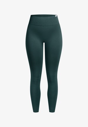Leggings de talle alto en verde oscuro, confeccionados con tela elástica. Textura lisa, diseño ajustado al cuerpo, sin costuras visibles ni patrones.