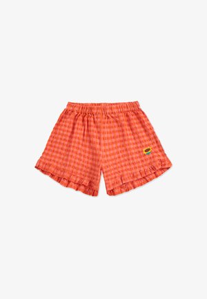 Pantalones cortos a cuadros naranjas con cintura elástica, dobladillo rizado y un detalle bordado de girasol en la parte inferior izquierda.