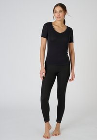 Damart MANCHES COURTES THERMOLACTYL SENSITIVE - Maglietta intima - noir