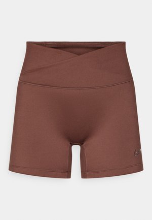 Pruunid sportlikud lühikesed püksid kõrge vöökohaga ja ristatud eeskujundusega. Valmistatud siledast ja venivast materjalist. Küljel väike logo.