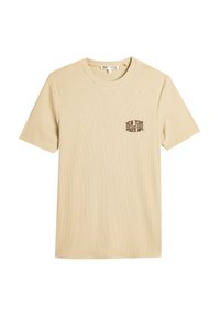 Beige T-shirt med korte ærmer lavet af ribbet stof. Har et lille, mørkebrun "New York Athletic Dept." grafik på venstre bryst.