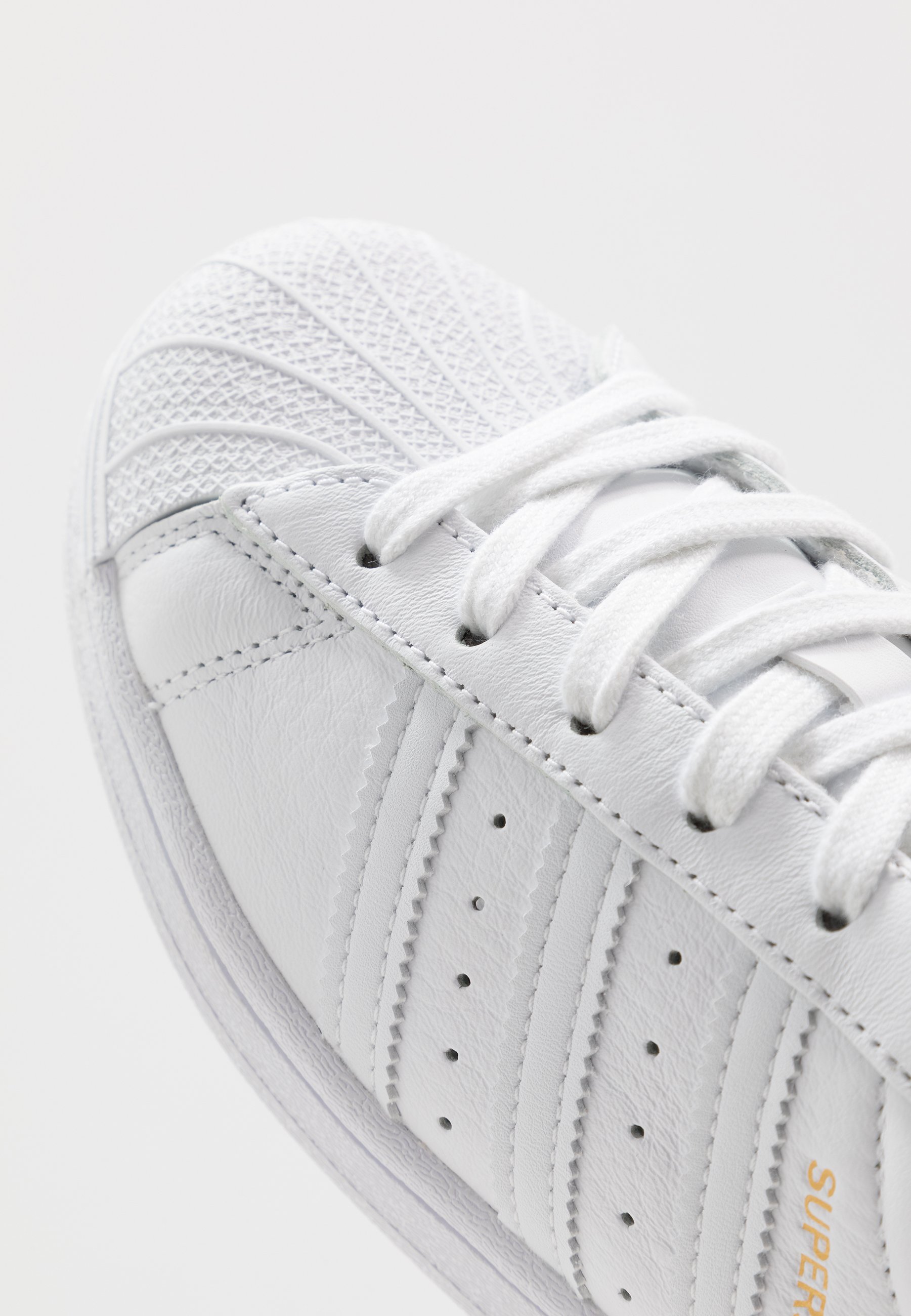 white superstar trainers