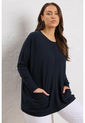 - Sweter