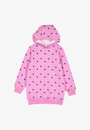 Vaatehuppari vaaleanpunaisena, pehmeällä pinnalla, jossa on toistuva kuvio pienistä sinisistä ja tummansinisistä nuolista sekä vaaleanpunaisia yksityiskohtia.