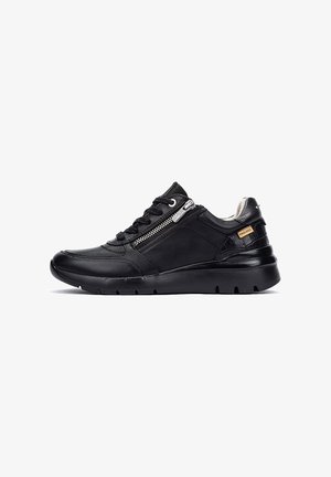 Black leather sneaker with a smooth finish, lace-up front, side zipper detail, and cushioned sole. Features subtle branding on the heel.