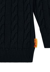 Maglione nero a maglia rasata con un motivo testurizzato, orlo a coste e un piccolo etichetta gialla di lato. Il tessuto sembra spesso e accogliente.
