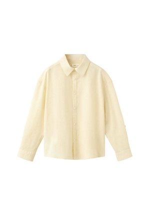 Chemise crème à manches longues avec boutons, col pointu, poignets boutonnés et coupe décontractée, présentée sur fond blanc.