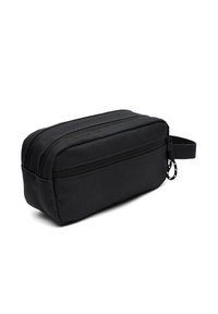Black rectangular cosmetic bag with textured fabric, dual zip closures, and a side handle for easy carrying. Simple, functional design.
