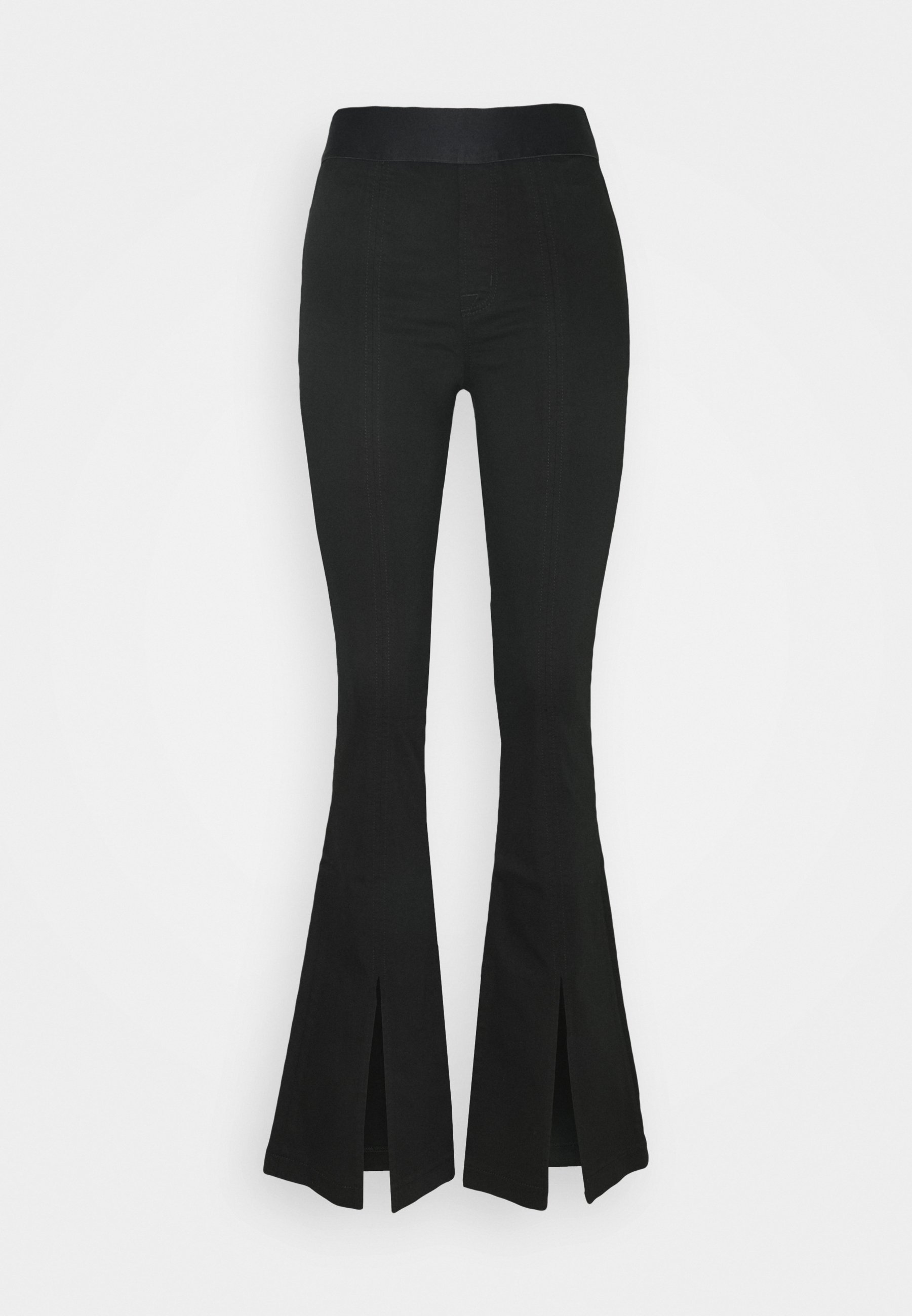 flared jeans met split