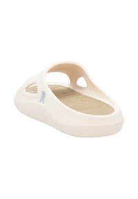 Sandale à glissière beige avec un design ouvert, présentant des découpes latérales, une semelle intérieure texturée et une semelle lisse et incurvée pour un maximum de confort.