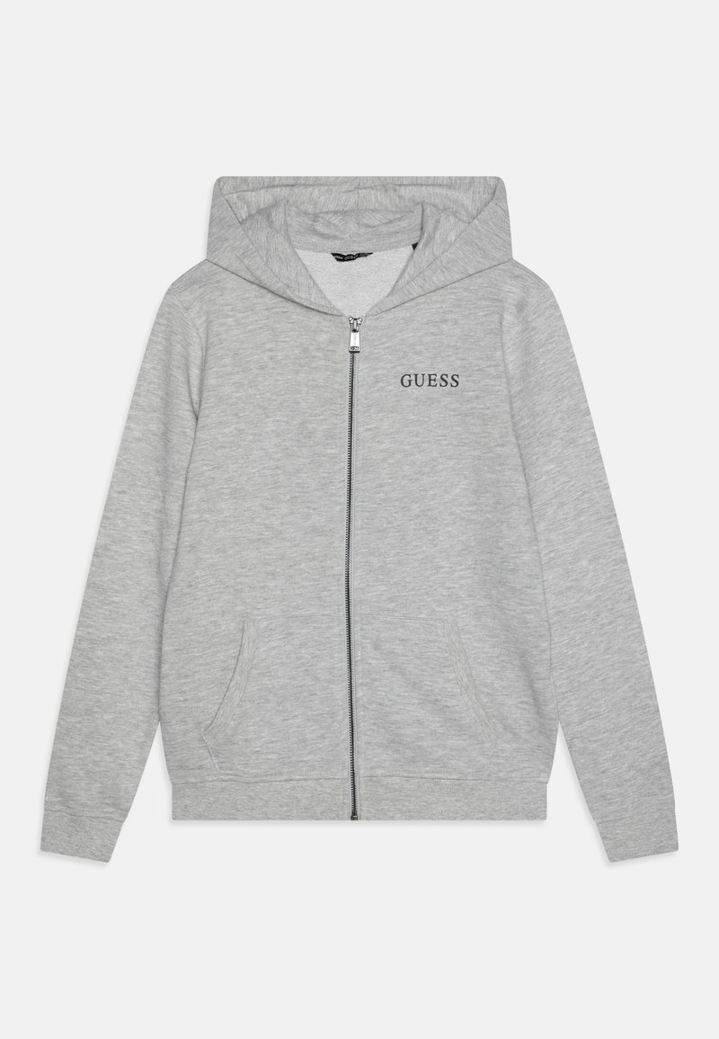 Grey zip-up hoodie with a drawstring hood, front pockets, and black "GUESS" logo on the left chest. Made of soft fabric.