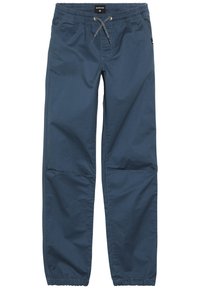 Pantalones de tela elástica azul con cintura elástica, cordón ajustable y bolsillos laterales. Presentan un ajuste relajado y perneras ajustadas.