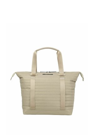 Sac fourre-tout matelassé beige avec deux poignées supérieures, couture horizontale et compartiment principal zippé.