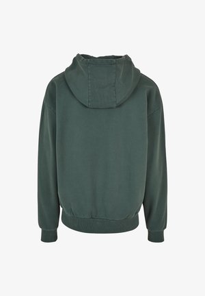 Zielona bawełniana bluza z kapturem o teksturowanym wykończeniu, z regulowanym kapturem, ściśniętymi mankietami i pasem, zaprojektowana w luźnym kroju.