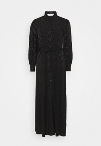 Robe noire à manches longues avec un devant boutonné, ceinture à la taille, et un motif de points subtil. Fabriquée en tissu léger avec une silhouette fluide.