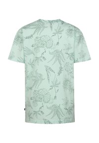 Camiseta de manga corta en verde menta claro con un patrón de contornos florales y botánicos. Hecha de tela suave con un ajuste relajado.