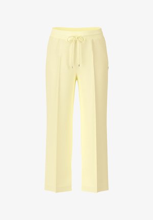 Light yellow straight-leg pants with elastic waistband and front drawstring, made of soft fabric.