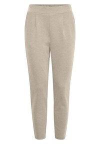 Beige broek gemaakt van zachte stof met een taps toelopend ontwerp, centraal geplooid en met een elastische tailleband. Voorzien van zijzakken.