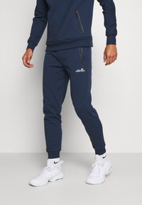 Ellesse - OSTERIA - Verryttelyhousut - navy Pienoiskuva 1