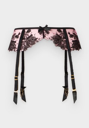 Porte-jarretelles en dentelle rose et noire avec un motif floral, quatre bretelles noires réglables et un petit nœud noir au centre.